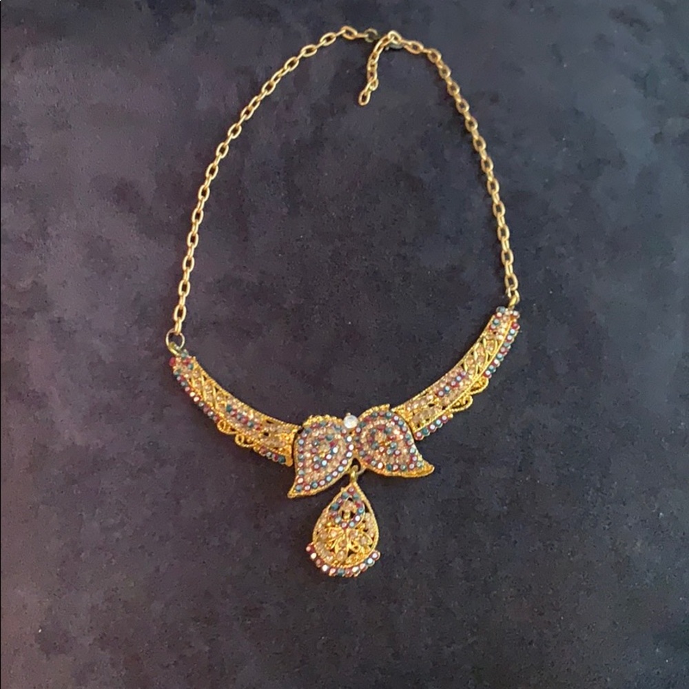 Gold and jeweled necklace